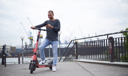 men on a el scooter